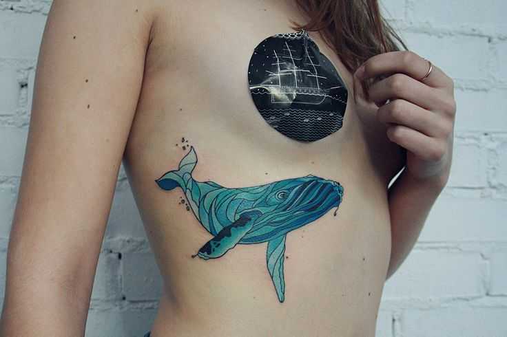 Тату кит: что означает символика морского млекопитающего
